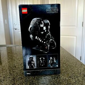 The fighter pilot, Star Wars Lego helmet.